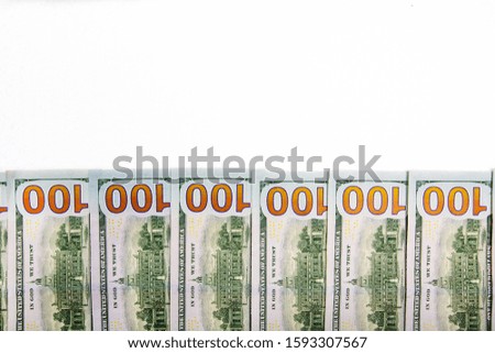 A pile of  US banknotes with president portraits. Cash of  dollar bills, dollar background image.
