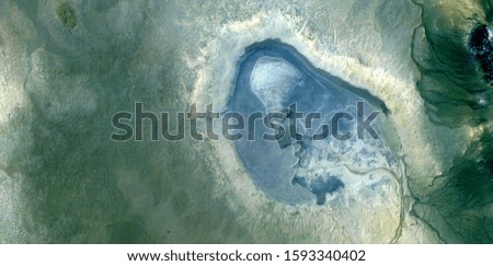 born in a polluted Earth, abstract photography of the deserts of Africa from the air. aerial view of desert landscapes, Genre: Abstract Naturalism, from the abstract to the figurative, 