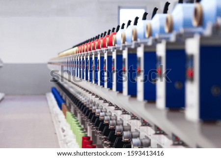 Textile machinery.  spinning production. Textile factory