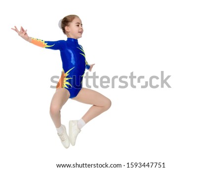 The gymnast performs a jump.