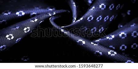 Background texture, decorative ornament, sky blue silk fabric, blue sapphire, a fine, strong, soft, lustrous fiber produced by silkworms in making cocoons and collected to make thread and fabric.