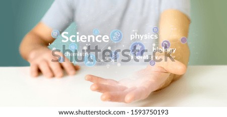 View of a Businessman holding Science icons and title 