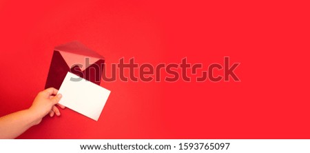Red envelope on a colored background.