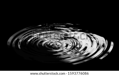 Water ripples from a drop of water in the dark. water drop dark tone. Abstract black circle water drop ripple. Liquid texture background.Rippled liquid with mood effect in black and white. Royalty-Free Stock Photo #1593776086