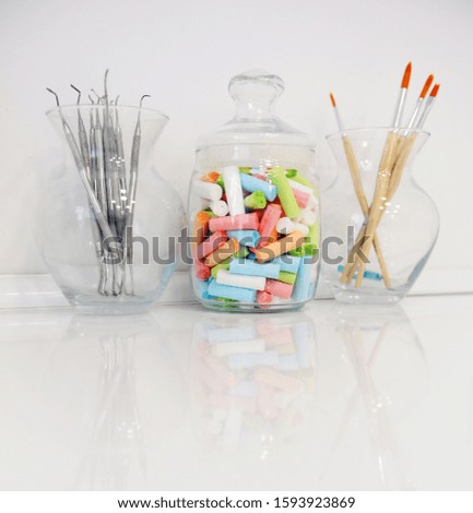 Dental tools on glass surface