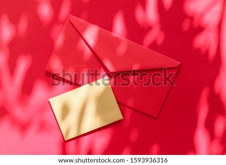 Holiday marketing, business kit and email newsletter concept - Beauty brand identity as flatlay mockup design, business card and letter for online luxury branding on red shadow background