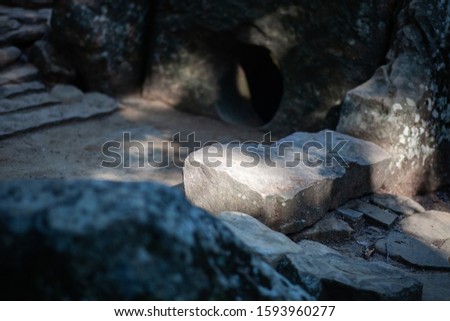 Ancient megalithic structures. Of the big stones. With a hole and a hole in the center. Traditional historical finds. On open air. Screensaver for the desktop. Dolmen stone table. Russia.
