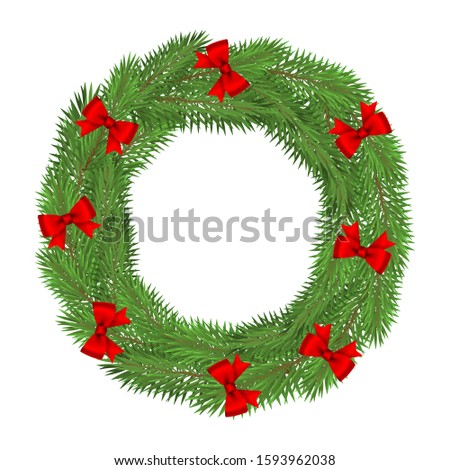 Wreath of Christmas tree branches isolated on a white background.