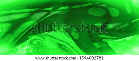 Background texture, decorative ornament, green polka dot fabric, round dots on fabric that have the shape or approximately resemble a circle or cylinder.