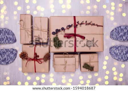 Gift boxes on the floor. Colorful gifts box. Christmas composition