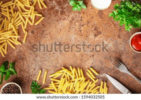 penne pasta and sauce (set of ingredients) menu concept. top food background. copy space