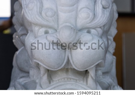 The beautiful pattern lion statue