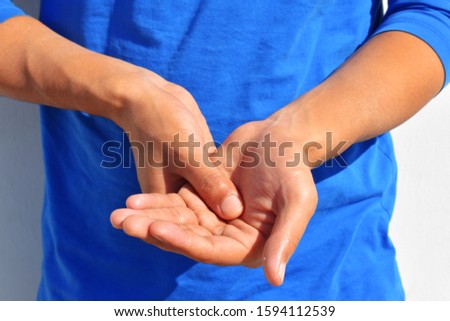 Man holding her hand, pain concept, isolate on white background