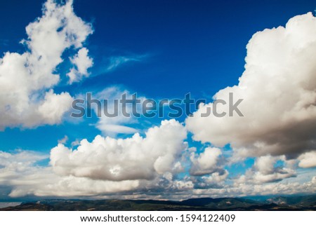landscape sunny skies with clouds mountain forest