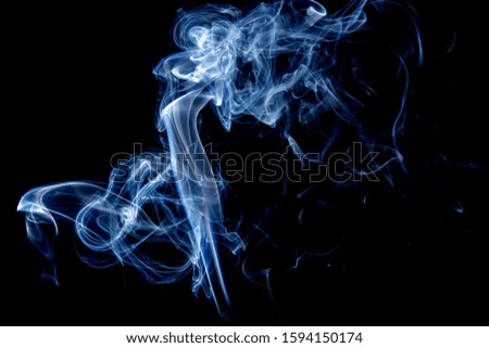 Abstract motion of white smoke isolated on a black background Can be modeled as hot food, smog, small clouds, and aromatic smoke
