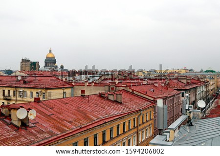 Panorama of the red roofs of St. Petersburg and St. Isaac's Cath