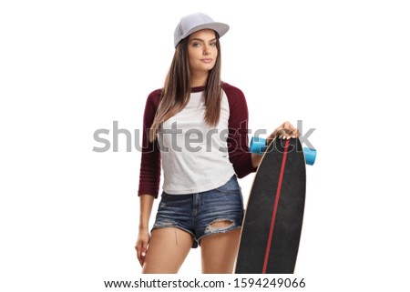 Beautiful young female with skateboard isolated on white background