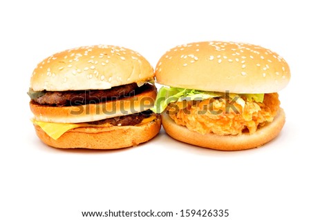Two large burgers on a white background