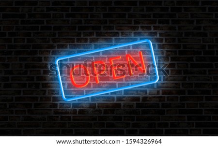 Open sign neon lamp. sparkles at night on brick wall