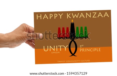 Happy Kwanzaa Day 1 principle (Umoja is Unity) Card held in hand on white background