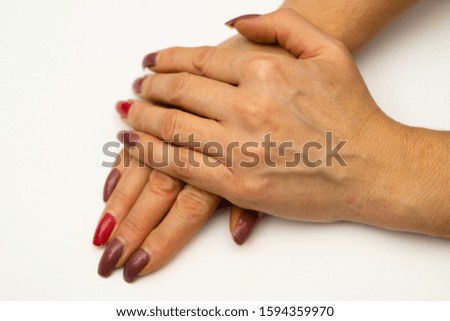 A woman's hands on a white background