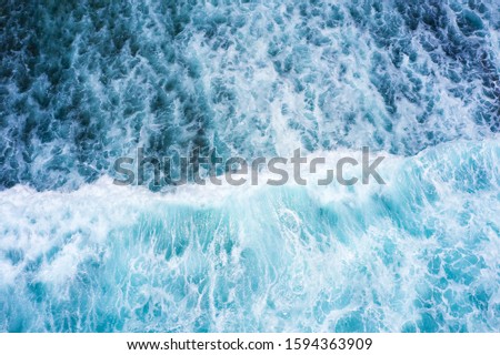 View from above, stunning aerial view of some ocean waves that forms a natural texture. Indian Ocean, South Bali, Indonesia.