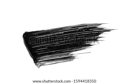 Mascara brushstroke smear smudge isolated on white background. Makeup texture. Cosmetic product  swatch Royalty-Free Stock Photo #1594418350