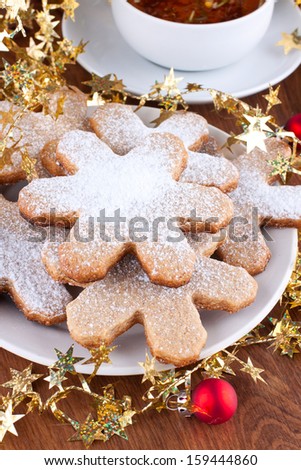 Plate of traditional gingerbread cookies with christmas decoration