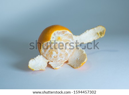 Mandarin peeled on a white background . holiday New year and Christmas