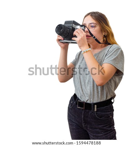 young girl takes pictures with a rare camera