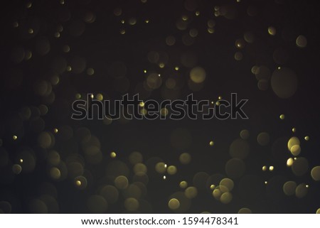 Abstract bokeh lights with light Yellow background
