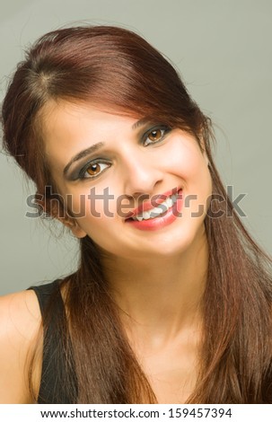 Beautiful and innocent girl with real smile