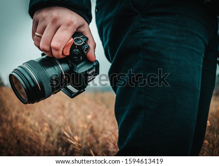 Present your photo camera equipment Royalty-Free Stock Photo #1594613419