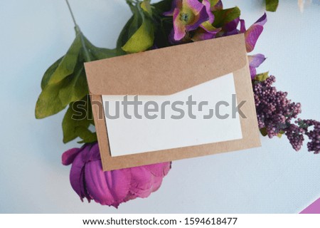 envelop mockup and purple flowers ,for valentine's day,mother's day.greeting card