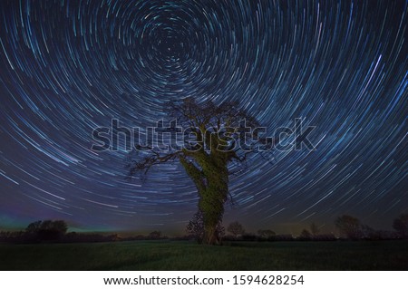 A breathtaking scenery of a unique meteor shower in the magical night sky