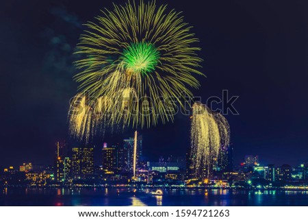 New Year's celebration fireworks in night city in Pattaya, Thailand.