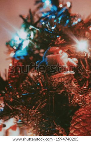 Santa Claus toy on the Christmas tree.
