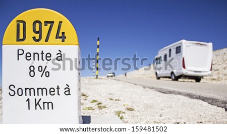 Mout Ventoux, milestone with motorhome, rv in france. Royalty-Free Stock Photo #159481502