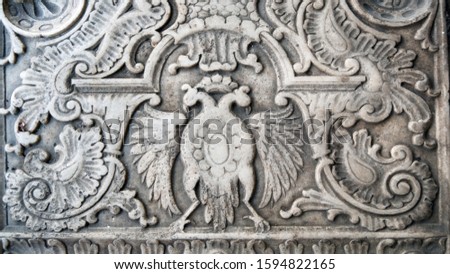 A richly decorated tombstone with double eagle from Eastern Europe