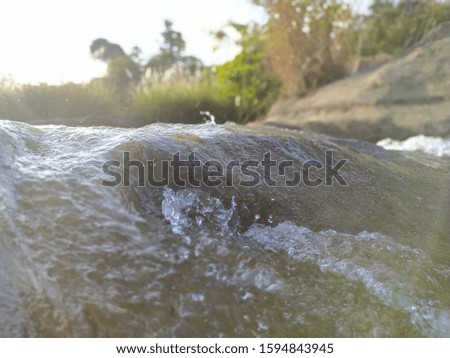 the water-flow with a perfect background makes one feel like take a dive... 