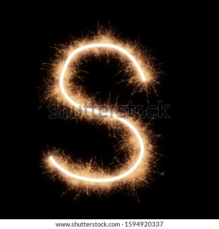 Lower case s letter of alphabet written by squib sparks on a black background.