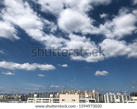Blue sky and clouds in summer afternoon