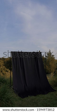 
Photo backdrop set design in a garden at sunset 