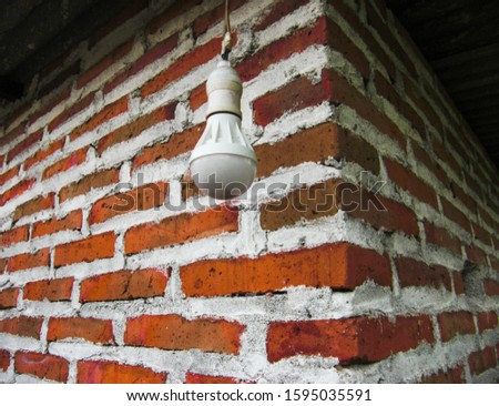 Led lights in the corner of the wall made of bricks