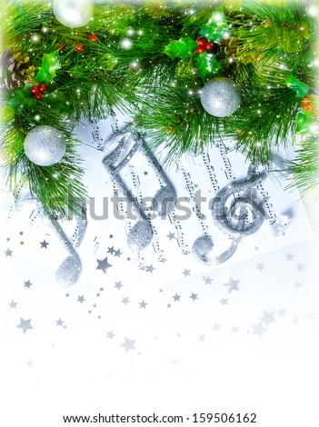Image of Christmas treble clef on notes pages, beautiful melody, silver ornament on green fir tree border, traditional Christmas carol, New Year greeting card, musical sheet, Xmas decoration 