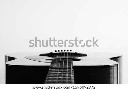 Guitar Strings, close up. Acoustic guitar. Black and white photography.