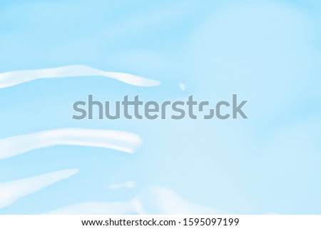 Blue cream, lotion texture. Skincare beauty product sample. Abstract liquid background