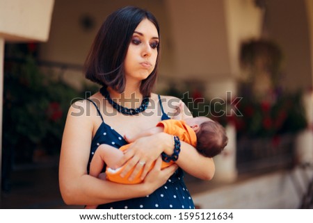 Stressed Young Mother Calming Her Baby. Anxious new mom holding her newborn in her arms
 Royalty-Free Stock Photo #1595121634