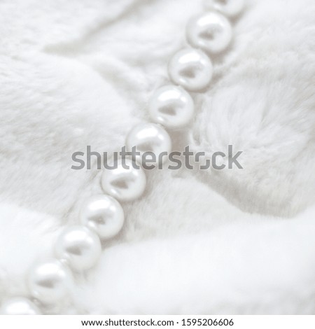 Jewelry branding, elegance and sale concept - Winter holiday jewellery fashion, pearl necklace on fur background, glamour style present and chic gift for luxury jewelery brand shopping, banner design