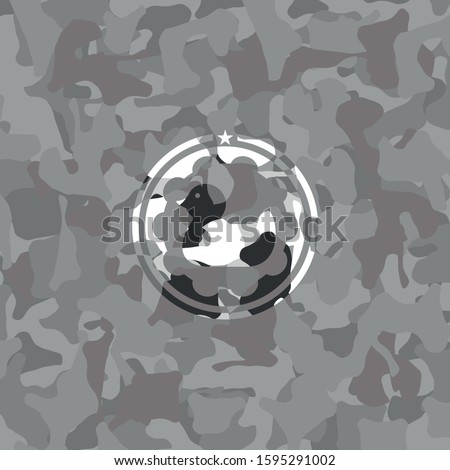 rubber duck icon on grey camouflaged texture